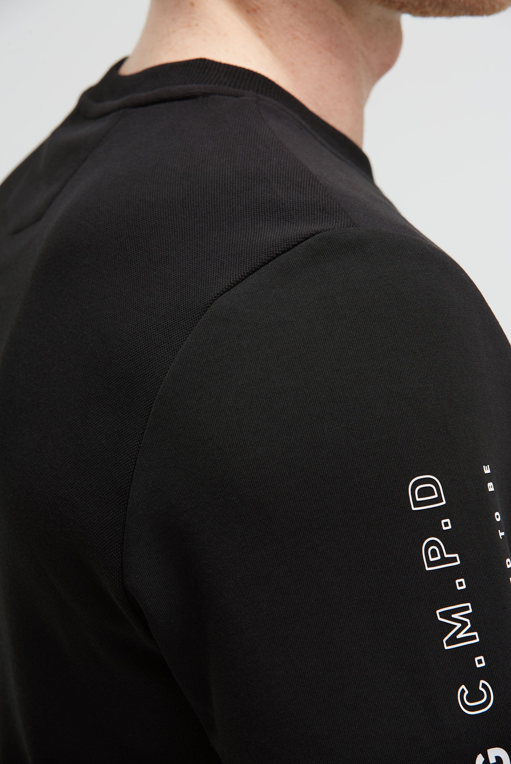 Bluza z interlocku z kieszenią na rękawie i nadrukiem