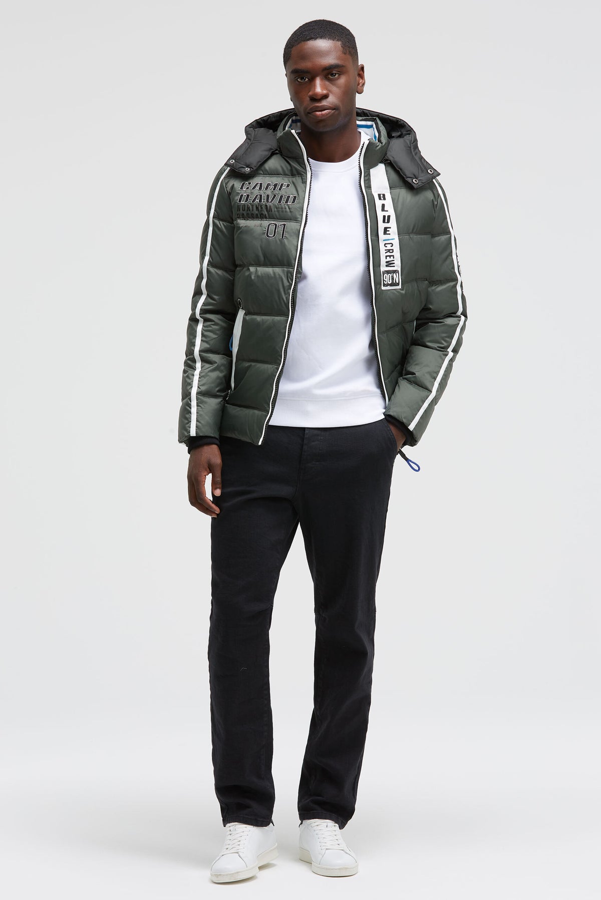 Lange Steppjacke mit Tapes, Patches und Kapuze dark forest