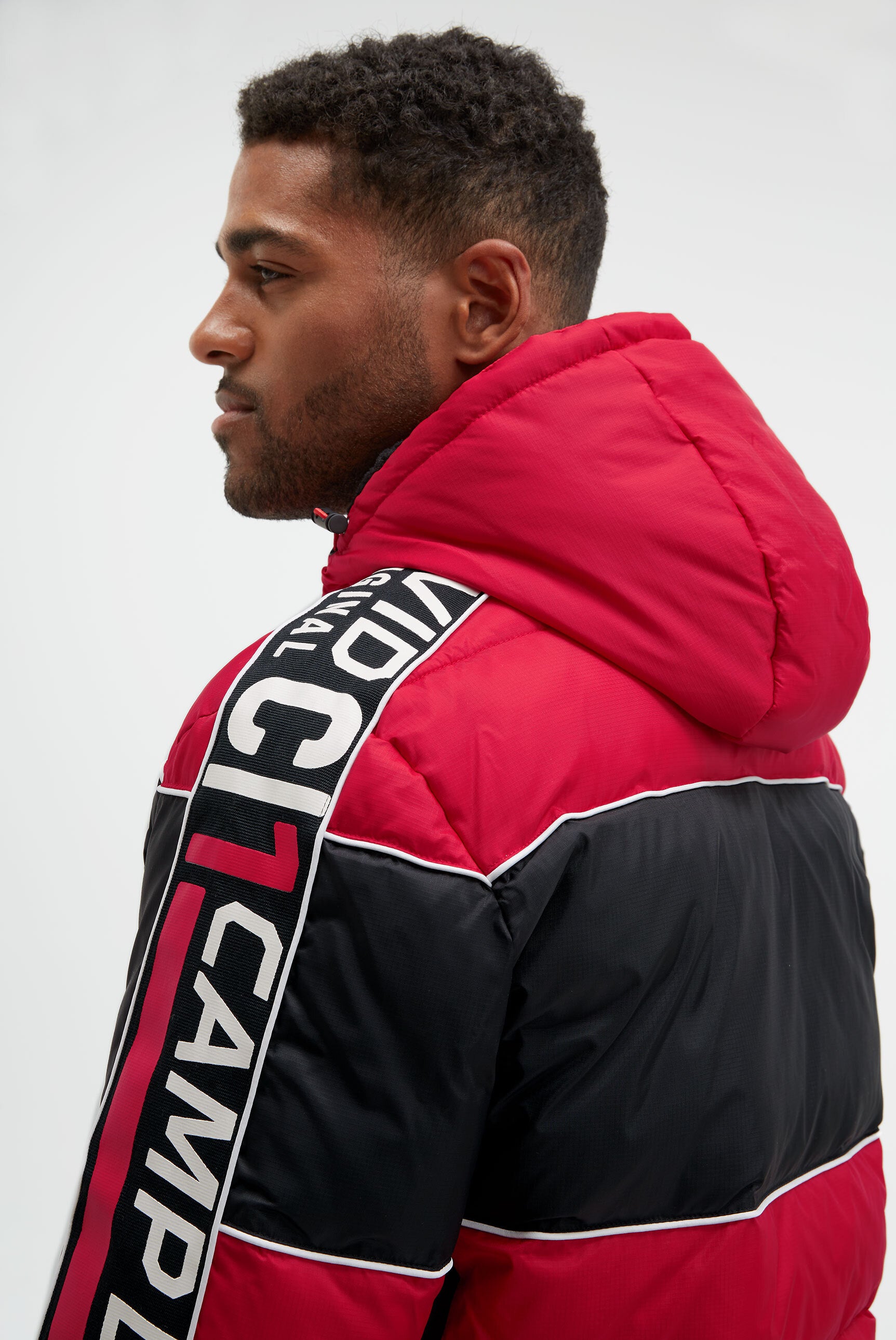 Pikowana kurtka z colour-blocking, taśmami i nadrukami - 7