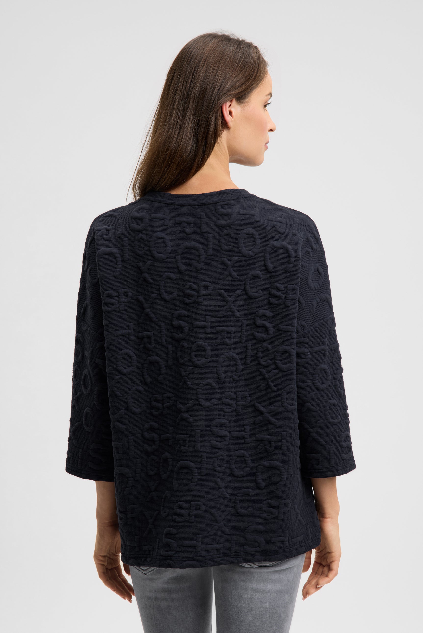 Bluza z fakturą i intarsjowaną grafiką