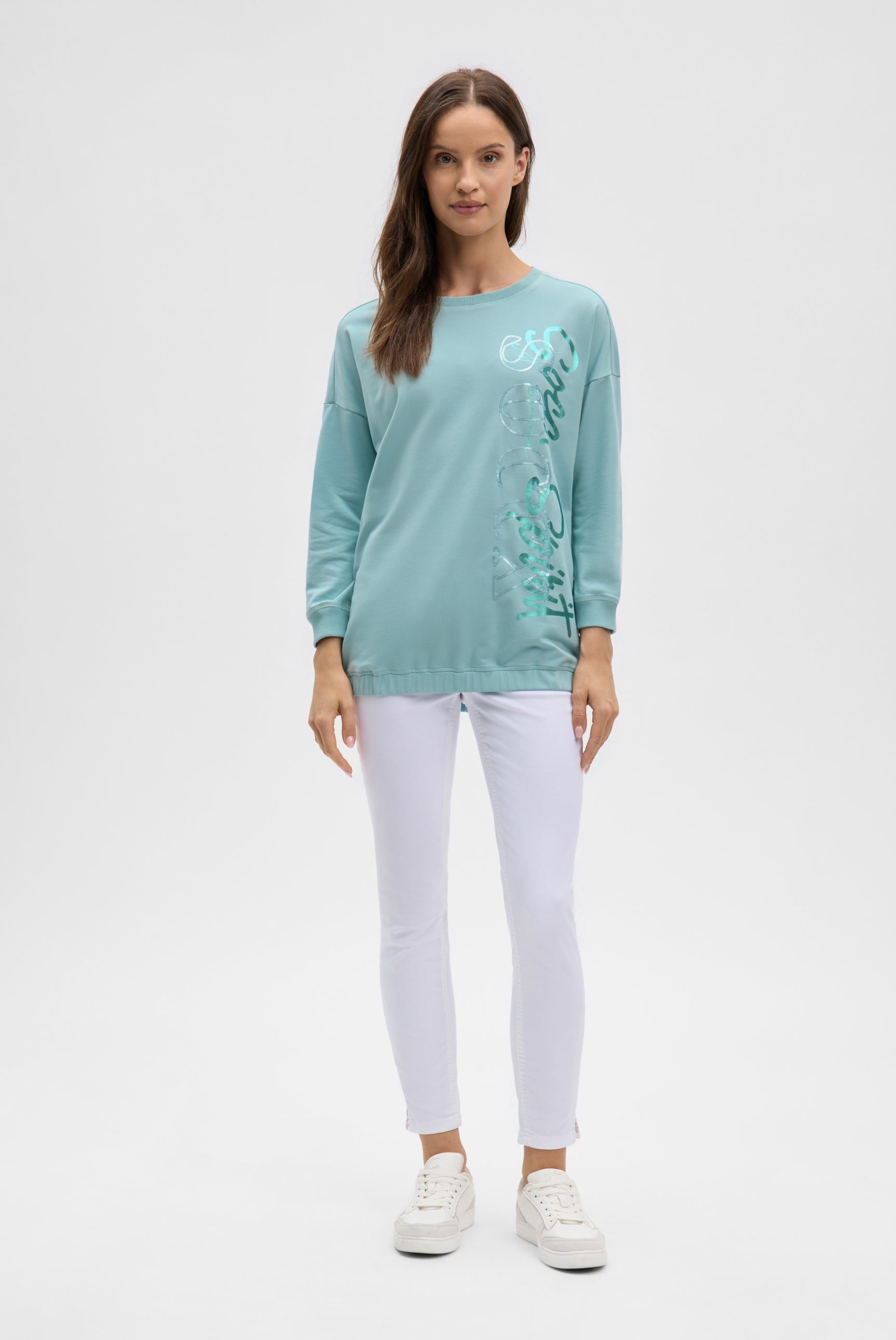 Bluza z gumką u dołu i logo z cekinów