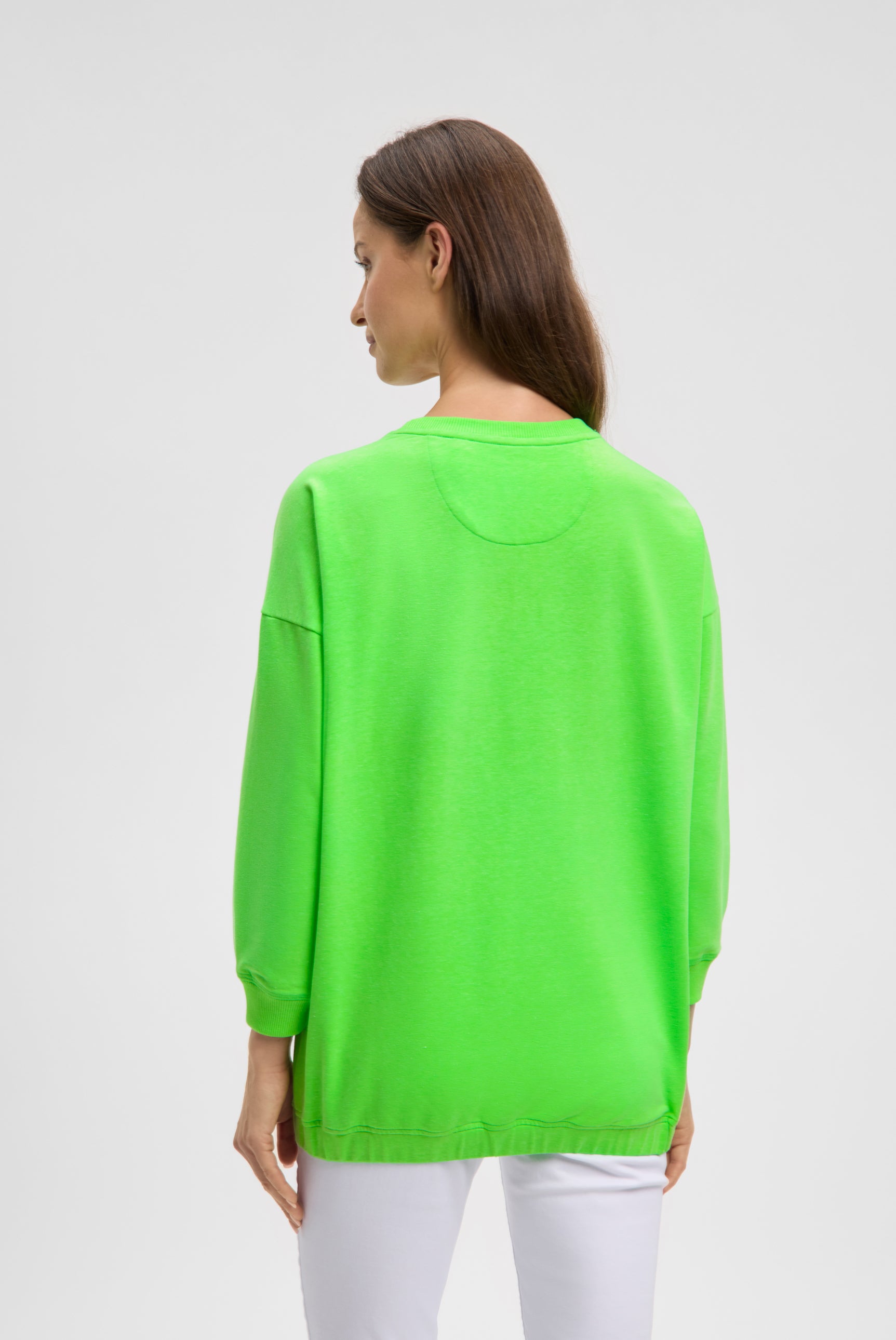 Bluza z gumką u dołu i logo z cekinów