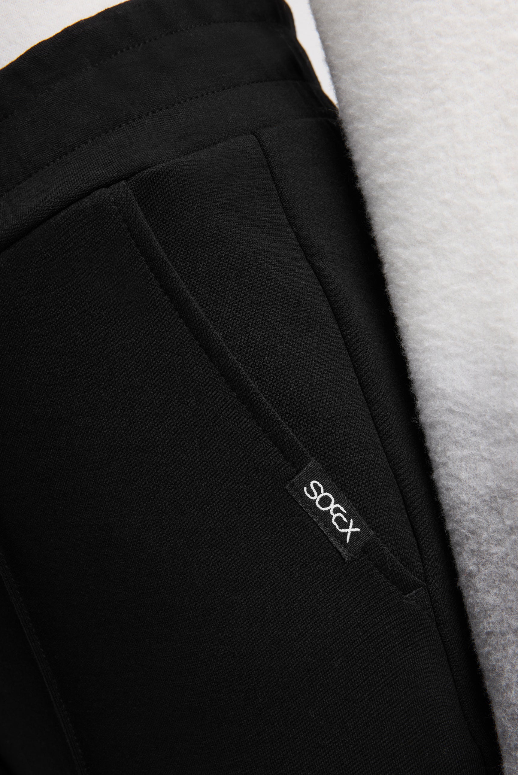 Spodnie z szerokimi nogawkami, kantami i elastycznym paskiem - 6