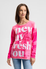 Sweter z nadrukiem na całej powierzchni i dżetami