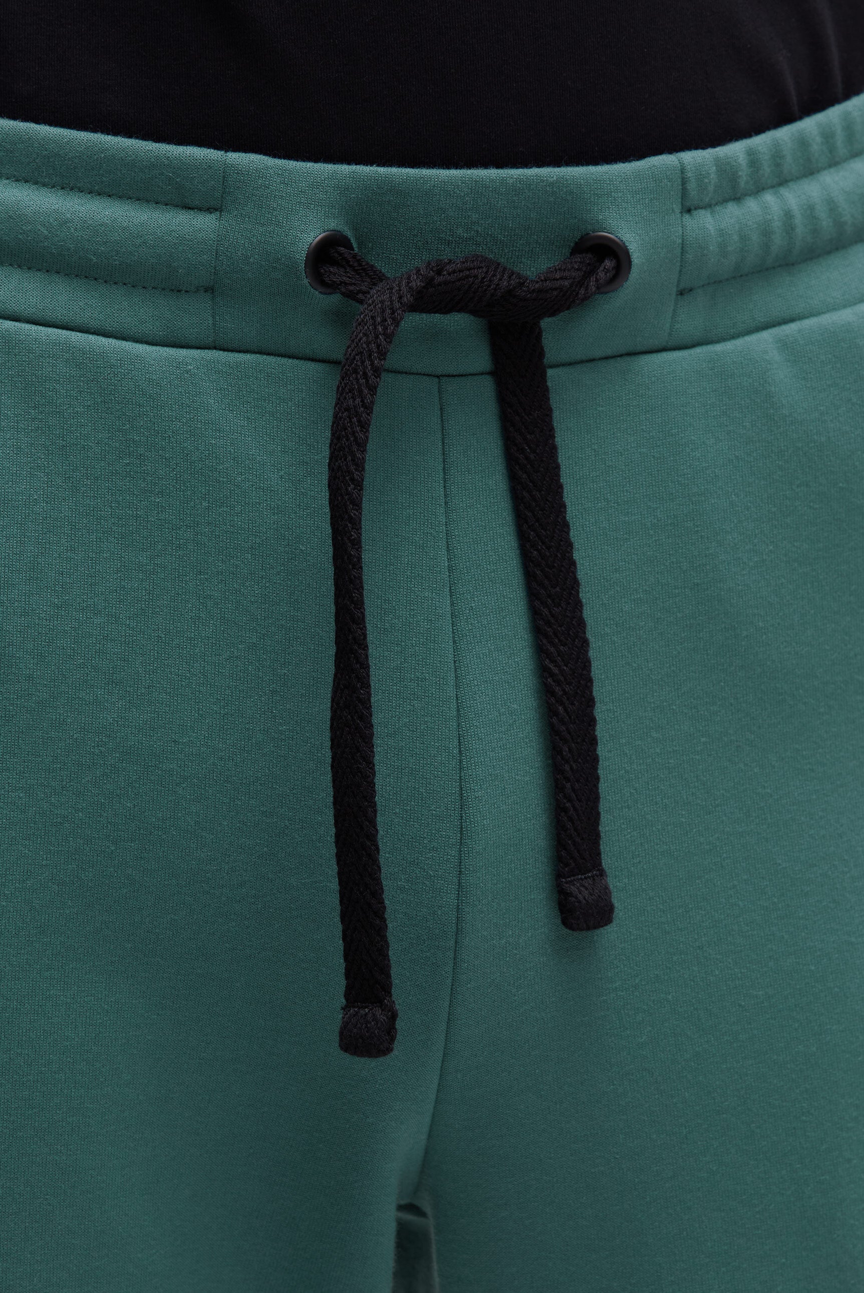 Jogginghose aus Interlock mit Seitentapes petrol green
