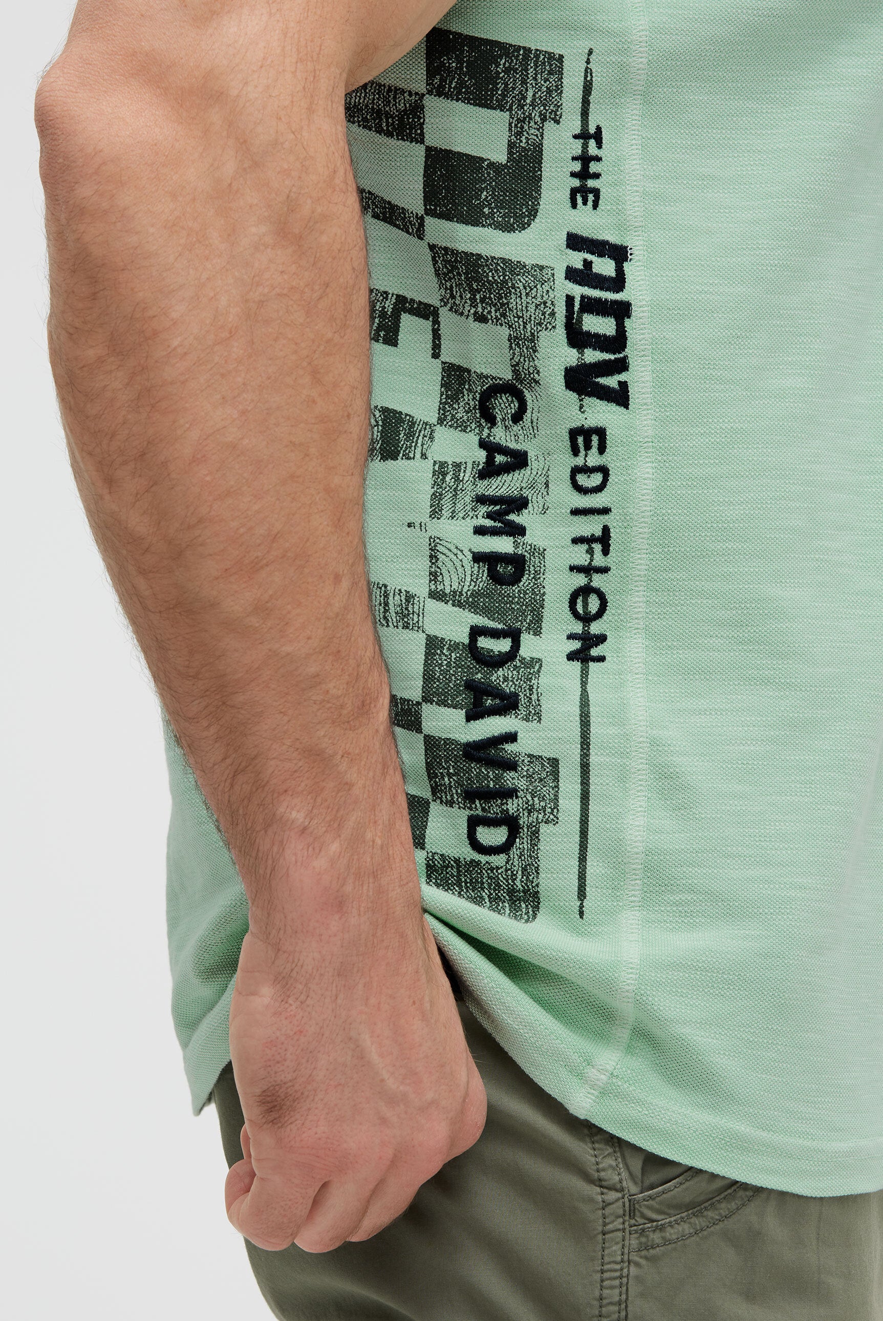 Polo aus Flammgarn-Pikee  mit Artworks light mint