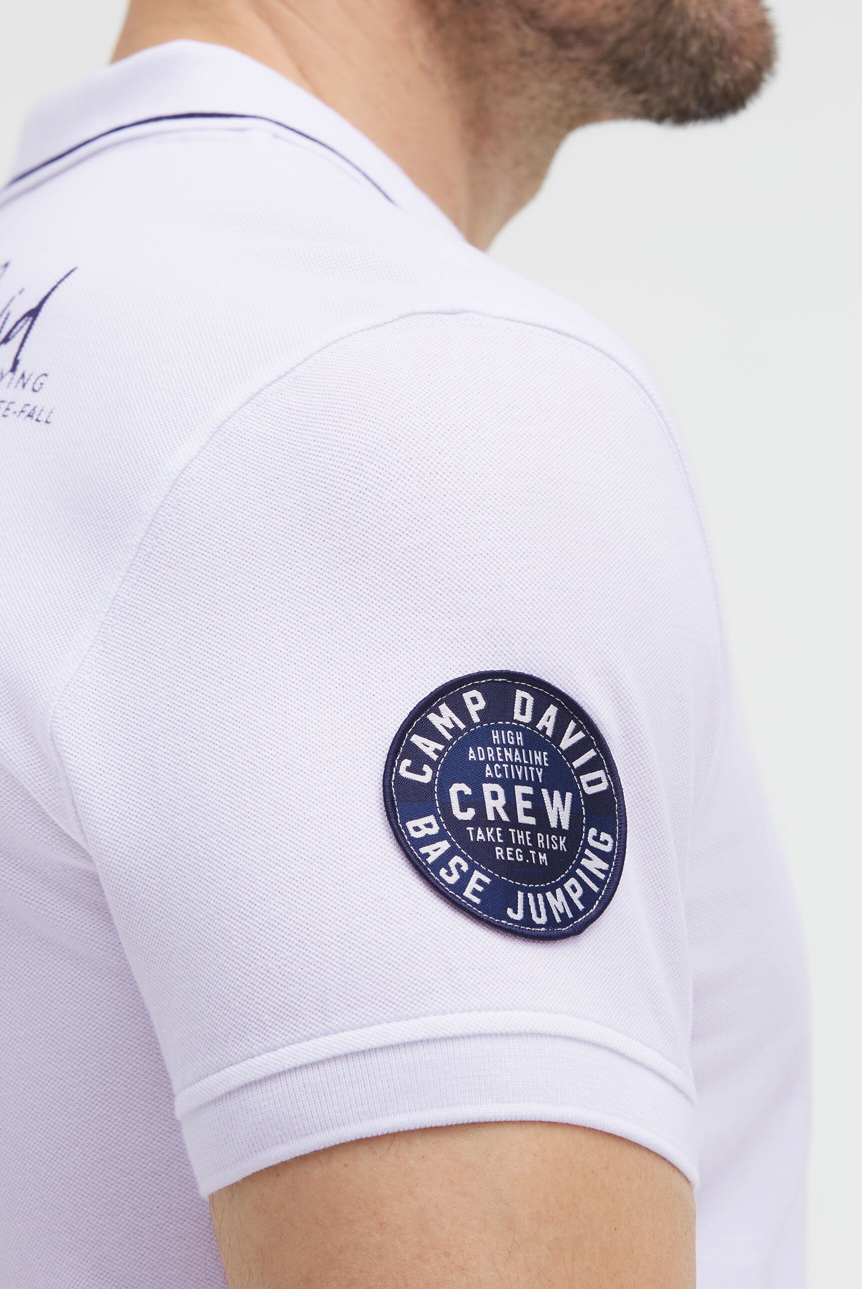 Koszulka polo z pikowanego materiału w stylu „dip dye” z nadrukami z logo