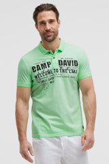 Kurzarmpolo Oil Dyed mit Logo Print neon green