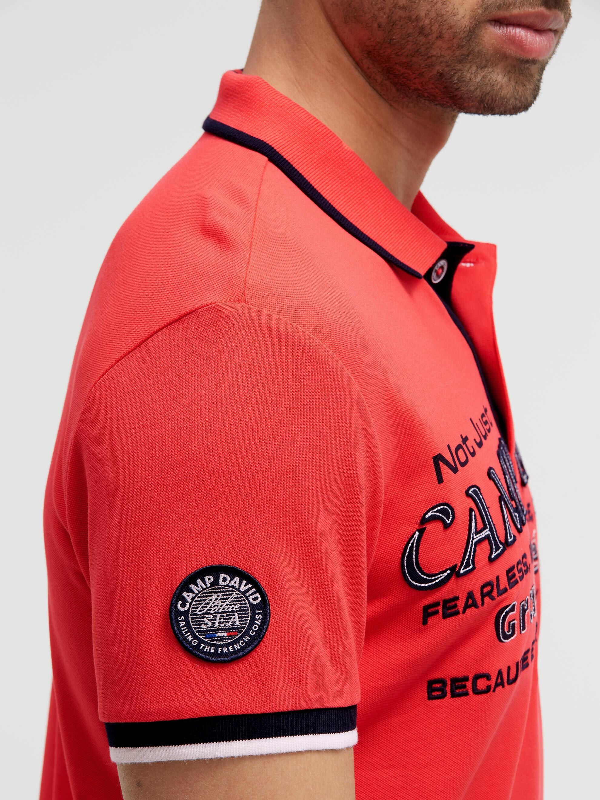 Kurzarmpolo Pikee mit Logo-Applikationen blaze coral