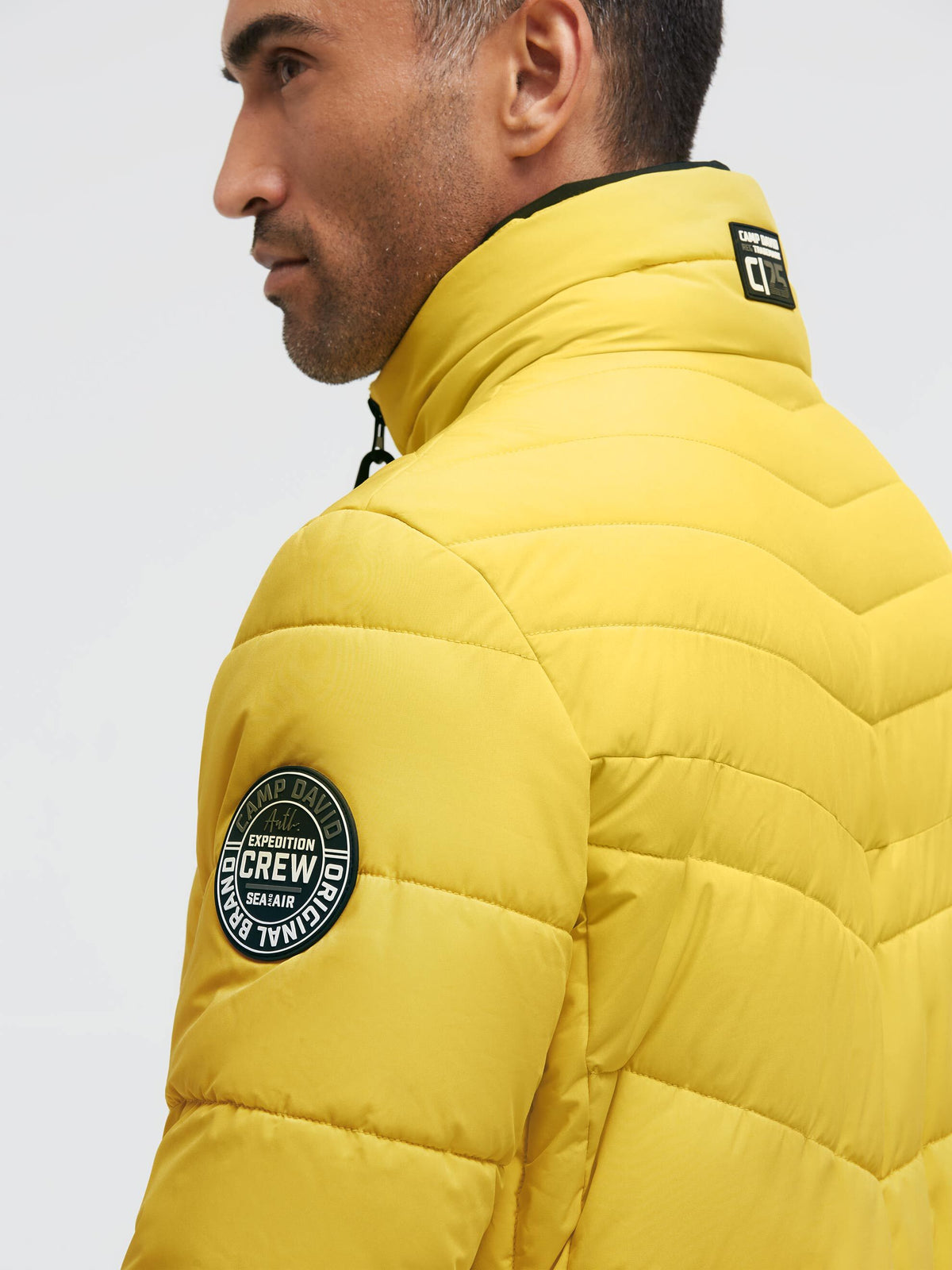 Winterjacke mit Stepp-Design und Logo-Tapes signal yellow
