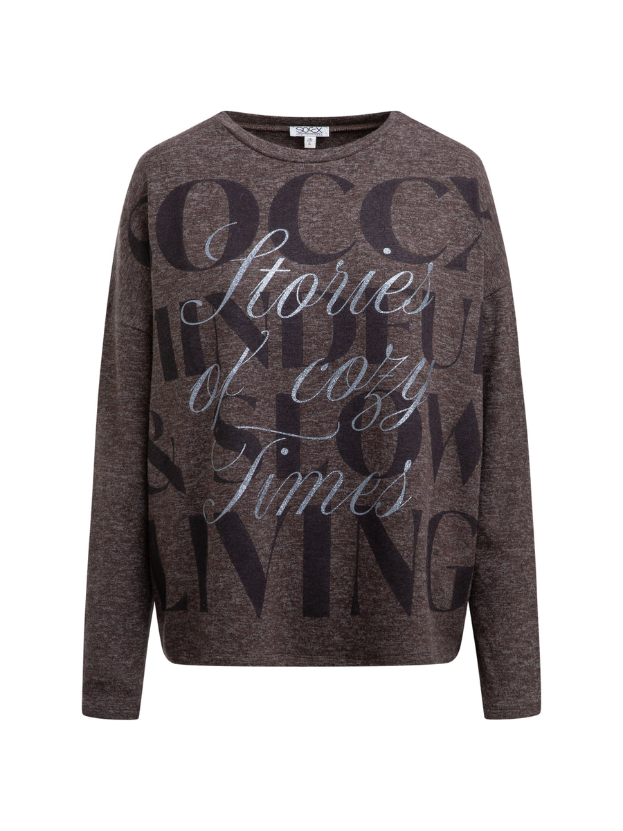 Sweter oversize z wzorem w kropki i nadrukiem z napisem